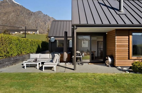 Kawarau Falls House | Urban Elegance is nestled in a peaceful neighbourhood - a perfect haven for relaxation.