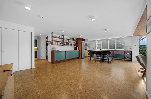 Devonport House | Walk to Village & Ferry is a beautifully designed ground-floor apartment offering the perfect combination of comfort, privacy, and convenience in one of Auckland's most sought-after seaside locations.