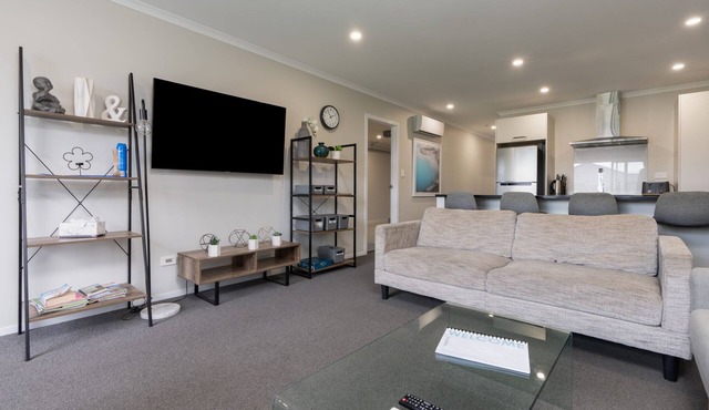 Modern work-ready Hamilton home with sauna and EV charging