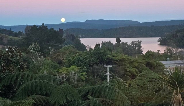 ŌKERE Ridge - Stone, native timber and tree ferns overlooking Lake Rotoiti in Okere Falls