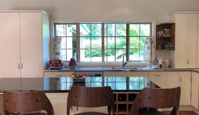 Serene Whangarei lifestyle luxurious modern home with trees and Garden Views in Glenbervie
