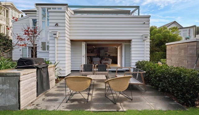 Walk to Village & Ferry is a beautifully designed ground-floor apartment offering the perfect combination of comfort, privacy, and convenience in one of Auckland's most sought-after seaside locations. in Auckland
