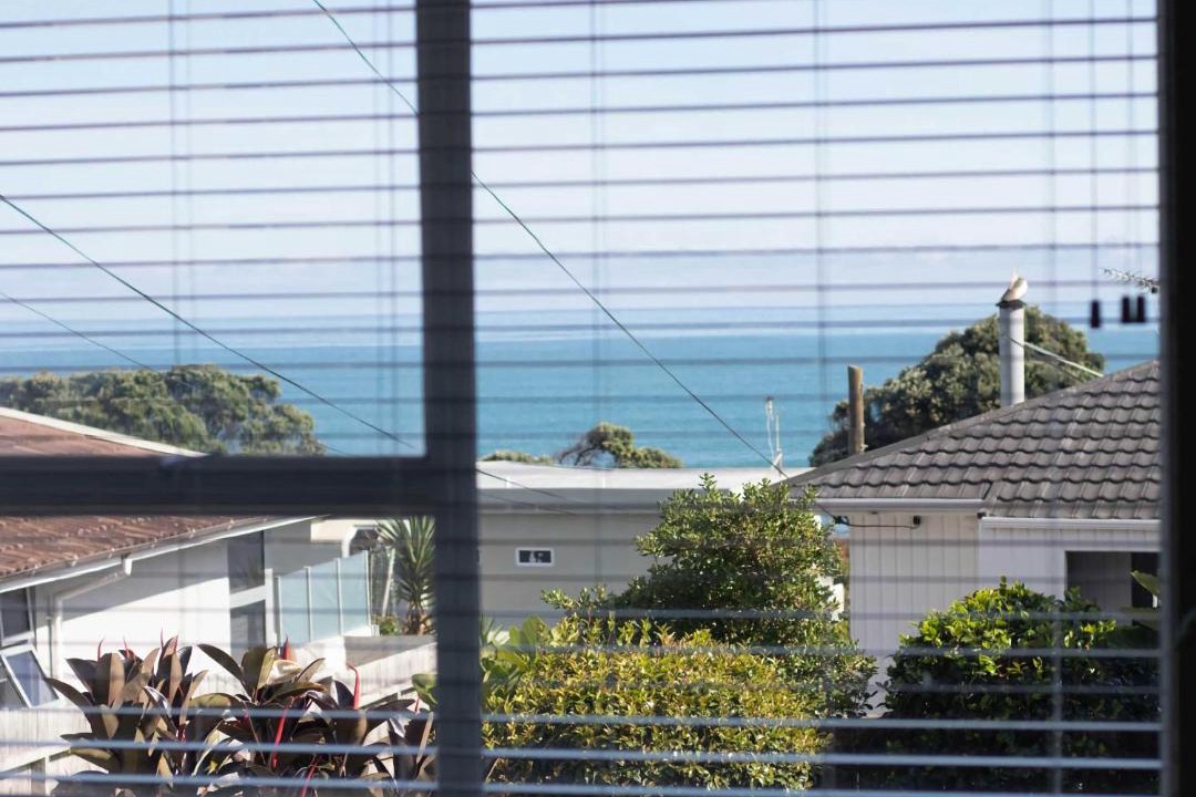 Rewa House | Blue Water Cottage - with beachfront coastal views