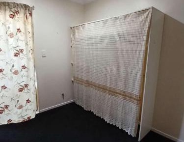 Queen Room with Shared Bathroom