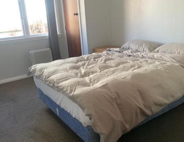 Queen Room with Shared Bathroom