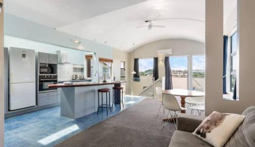 Three-Bedroom Apartment with Harbor View