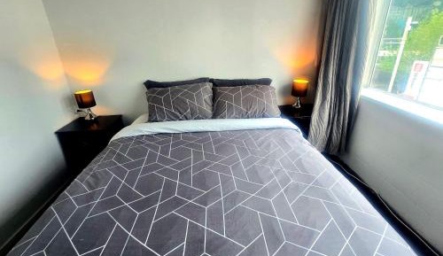 Queen Room with Shared Bathroom