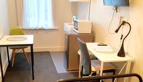 Single Room with Shared Shower and Toilet