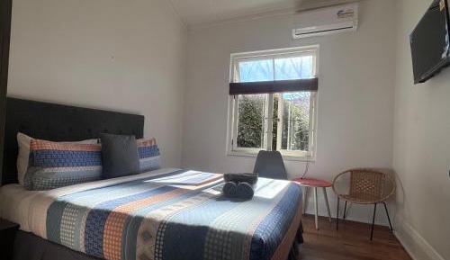 Queen Room with Shared Bathroom