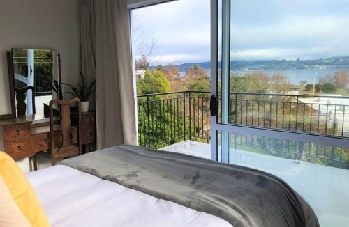 Two Mile Bay House | Modern, Stunning Lake Views & Hot Tub - Cross the street to the Lake!