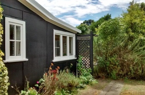 Waikanae Cottage | FOR SALE - penguin cottage / sheltered garden setting