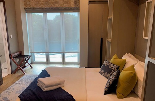 Raglan Hotel | Te Whaanga Retreat & Spa Lodge & Canvastown Luxury Glamping Tents
