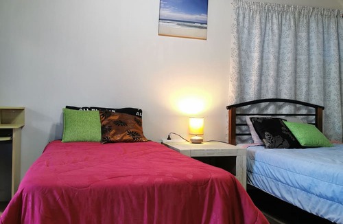 Titirangi House | Hilltop holiday home with stunning views.