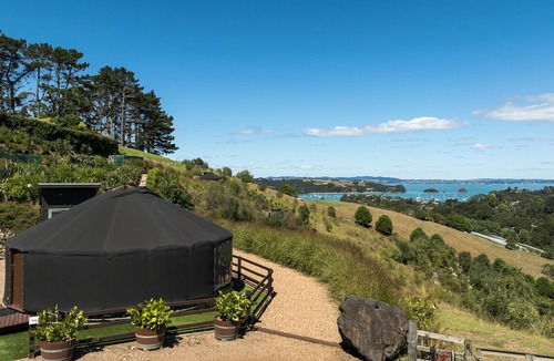 Palm Beach Cabin | Awaawa Yurts - Combined - 3 Yurt Package - Awaawa Yurts offer a luxury glamping experience on Waiheke Island. Stunning views, luxury queen sized bed, private bathroom with tea and coffee making facilities.