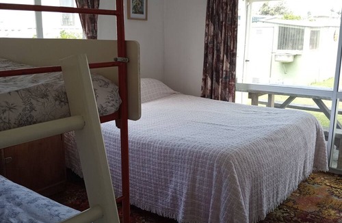 Karkari Peninsula Cottage | Classic Kiwi Bach.