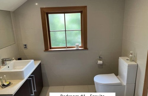 Okere Falls House | Rotoiti Lakefront Luxury with Tennis Court, Gym, and Jetty