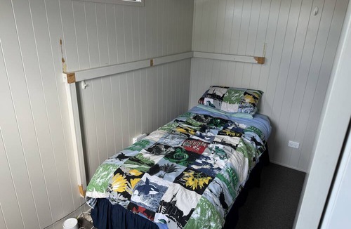 Waihi Beach Cabin | Escape to the idyllic shores of Waihi Beach.