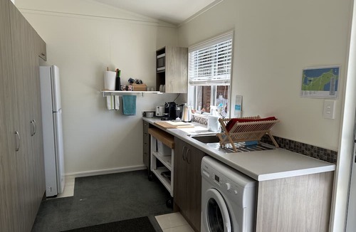 Kuaotunu Cottage | "Beach Baby" Cottage is a 3 min flat walk to the long sandy beach. Fab swimming
