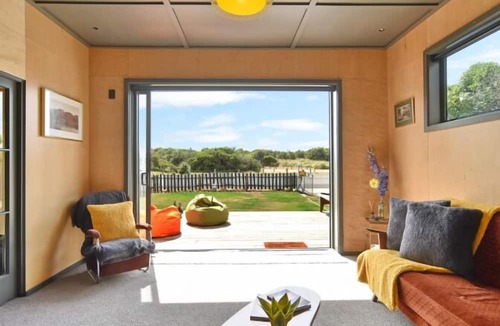 New Brighton Apartment | Splash Hut - Beach front Bach with a retro vibe