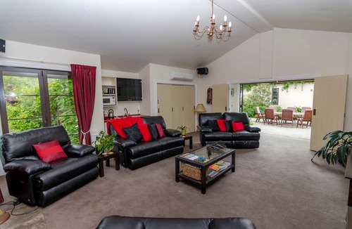 Gladstone Cabin | Cozy Rental with Sweeping Views of Lush Gardens and Farmland in Gladstone, New Zealand