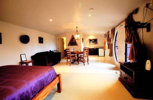 Otorohanga Cabin | Cute and Distinct Hobbit Accommodations in Hills of Waitomo, New Zealand