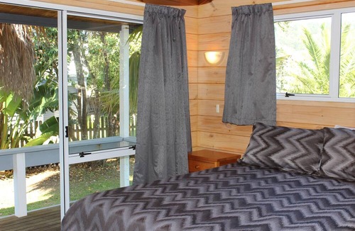 Matarangi House | 5 minutes walk to beautiful beach & shops, fully fenced section pet friendly.