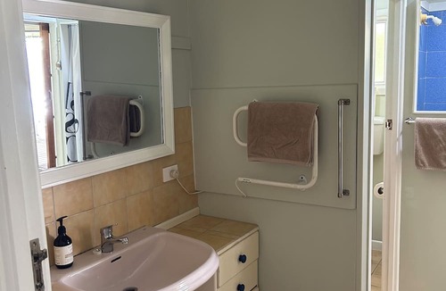 Baylys Beach House | Two minutes to the beach , Baylys Beach house, ample room, parking, decks.