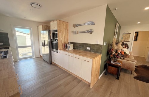 Palmerston North House | SQ Property; Autumn Hideaway. Customisable layout for small or large groups
