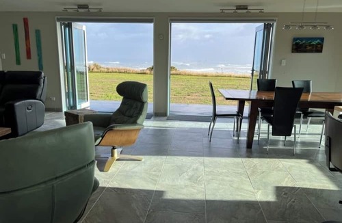 Cape Foulwind House | Relax at "Rocky Point" - a private, modern home w/cliff views of the Tasman Sea.