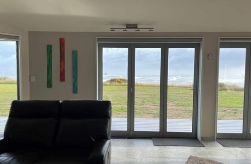 Cape Foulwind House | Relax at "Rocky Point" - a private, modern home w/cliff views of the Tasman Sea.