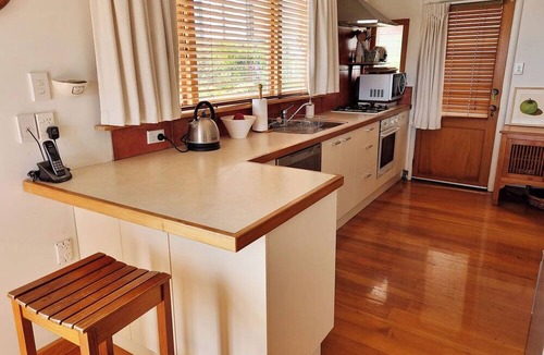 Nelson South House | Views, art, comfort, charming house in Nelson. Deck, beautiful garden and lounge