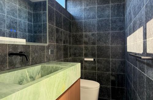 Otahuhu House | Designer Villa, Panoramic Views & Private Spa
