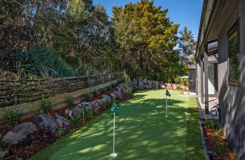 Langs Beach House | Black House Red Roof - Langs Beach Holiday Home
