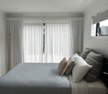 Hamilton House | Modern ensuite master bedroom in a shared home