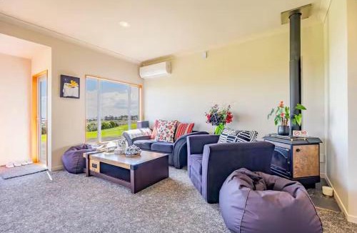 Clarks Beach Villa | Luxury Beachfront Farm Retreat w Private Beach