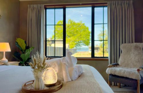 Ngongotaha House | Stillwater Resort - Lakefront Estate with two dwellings spa pools SUPs - Sleeps 16