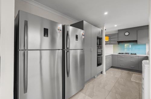 Pukehina Apartment | Waterfront location with estuary outlook and ocean beach access - sleeps 19