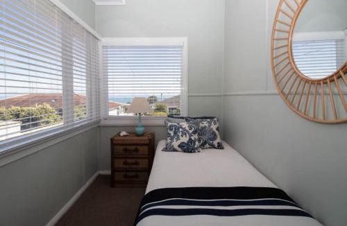 Rewa House | Blue Water Cottage - with beachfront coastal views