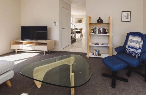 New Plymouth Apartment | Sail-Shaped Townhouse in New Plymouth