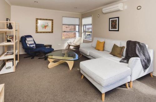 New Plymouth Apartment | Sail-Shaped Townhouse in New Plymouth