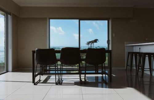 Bell Block Apartment | ABC on Wanaka Bay - beachfront home w. ocean views