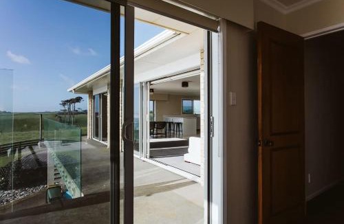Bell Block Apartment | ABC on Wanaka Bay - beachfront home w. ocean views