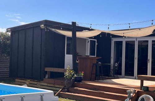Matarangi House | Sunsets on Harbour Kauri or Totara Cabin