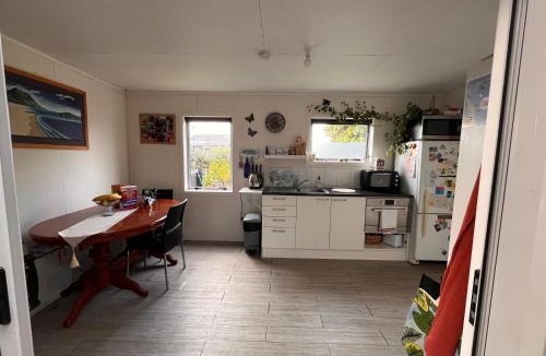 Matarangi House | Sunsets on Harbour Kauri or Totara Cabin