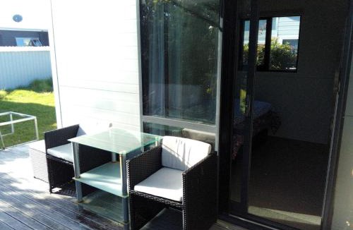 Matarangi Villa | Cozy Matarangi Cabin Garden and Lake views