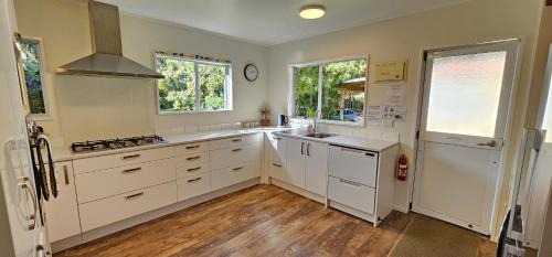 Pakawau House | Soggy Bottom Farm House, Sea views and peacocks