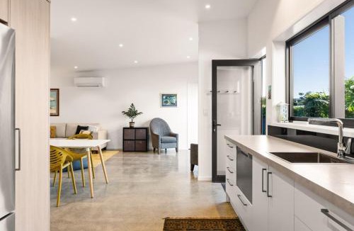 Wainui Apartment | 120m to Wainui Beach - Modern Coastal Unit