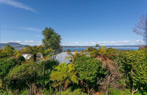 Acacia Bay House | Acacia Bay Retreat - Charming 3BR Retreat With Fireplace and Views