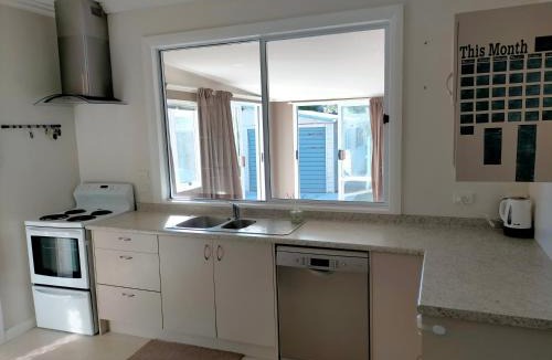 Otaki Beach House | Cosy Kiwi bach Kid and Pet friendly Beach house
