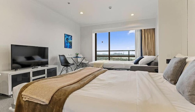 Skyline Sojourn Studio with Parking and Sea Views